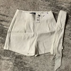 Brand new with tags. Express high-rise midi shorts.